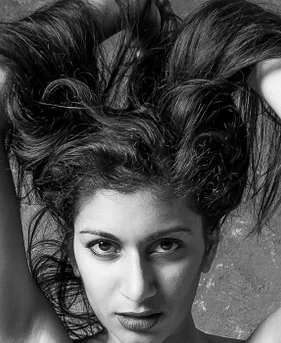 Black-and-white close portrait of an adult woman